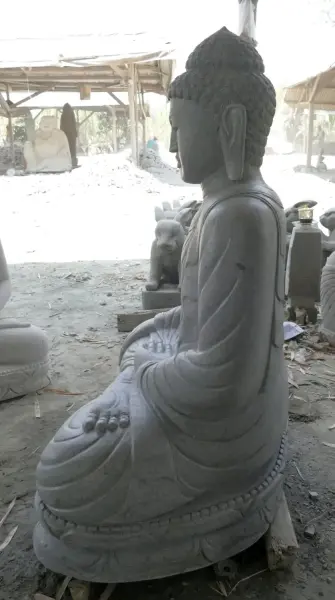 Product image 7 of the product “Seated Buddha made of Riverstone in Bhumisparsha - gesture of touching the earth. 117 cm height. ”